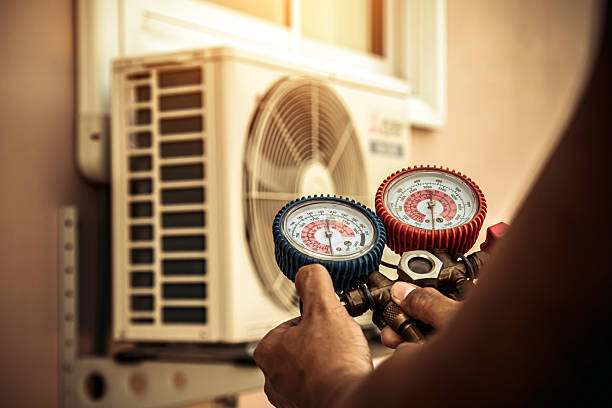 Professional Air Conditioning Service technician working in Billerica, MA